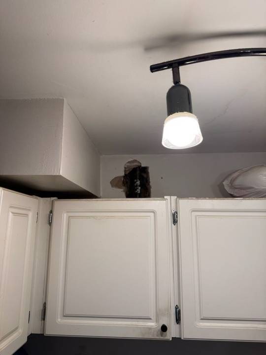 Above-cabinet fill, before